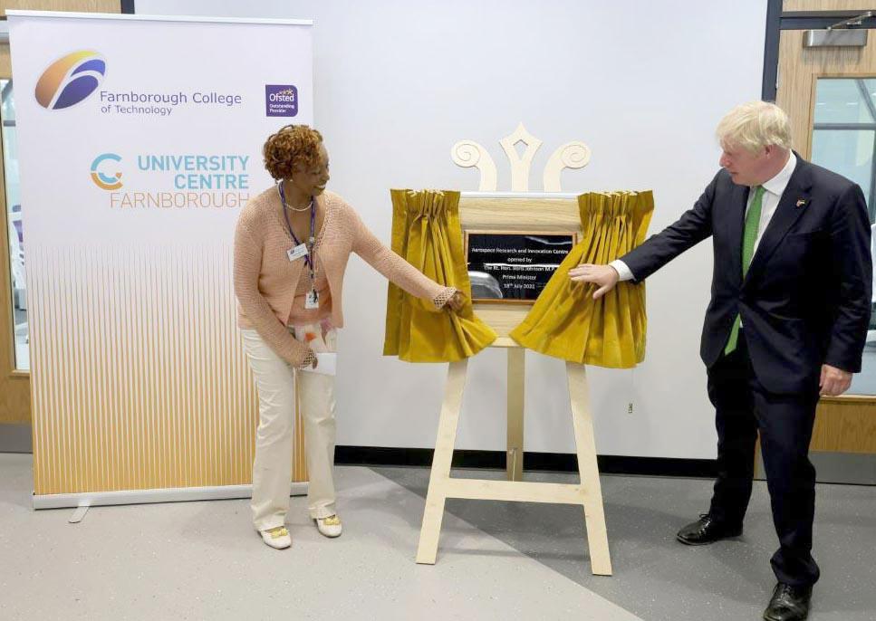 The Prime Minister Boris Johnson unveiling a plaque opening ARIC