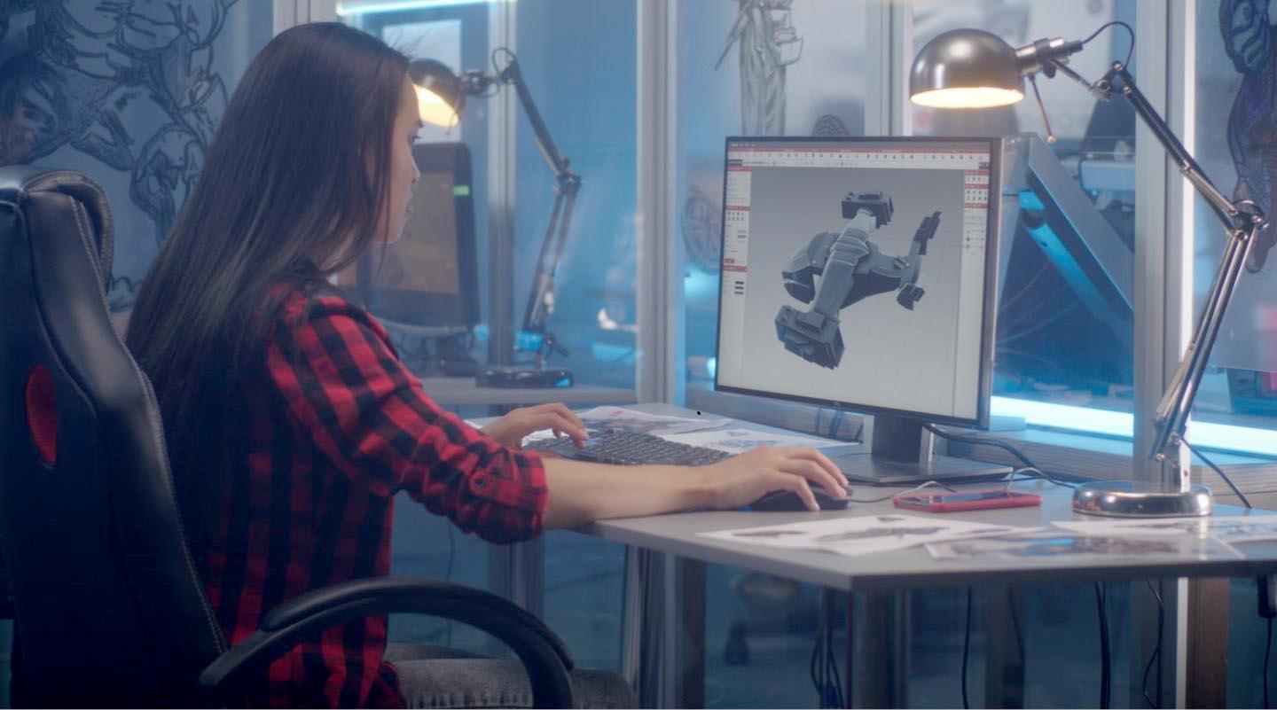 Creative industries image - woman designing a video game
